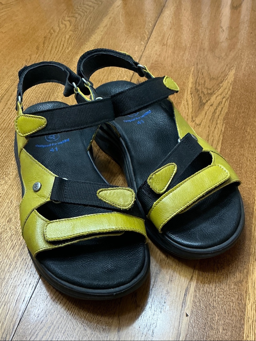 Woman’s Wolky green Velcro strap sandal. Size 41. Cushy black rubber bottom.